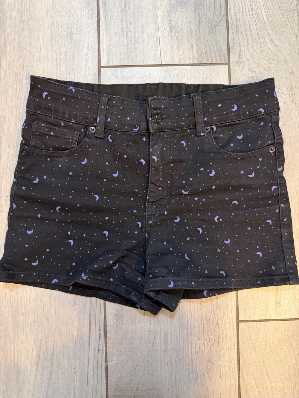 HT Denim shorts with purple stars and moons, size 7.